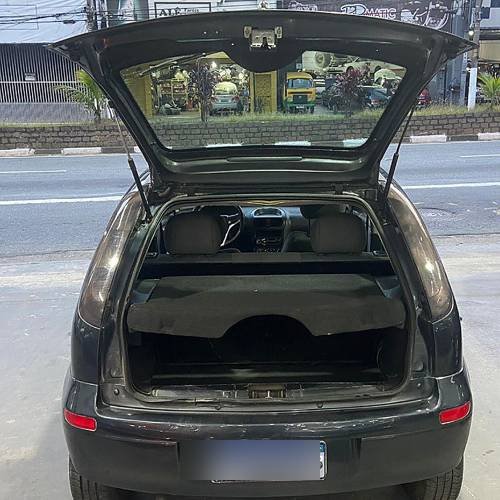 Carrinho de picolés em carro Hatch